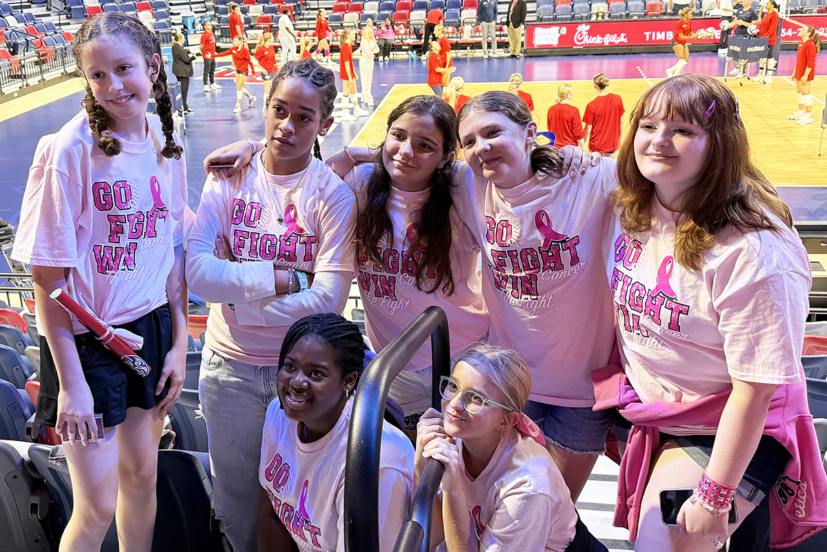 Some members of Banner Christian's girls’ volleyball team took in Liberty University’s girls’ volleyball match in Lynchburg on Friday, Oct. 9 as a part of the Flames’ program own ‘Dig Pink’ awareness night.